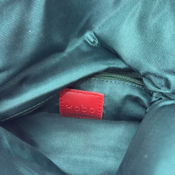 Hobo Women’s Oyster Opalescent Leather Clutch - Picture 11 of 12